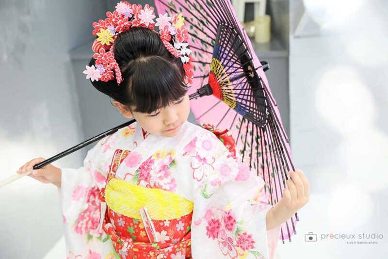 新日本髪にピンクの着物で7歳の七五三記念写真撮影